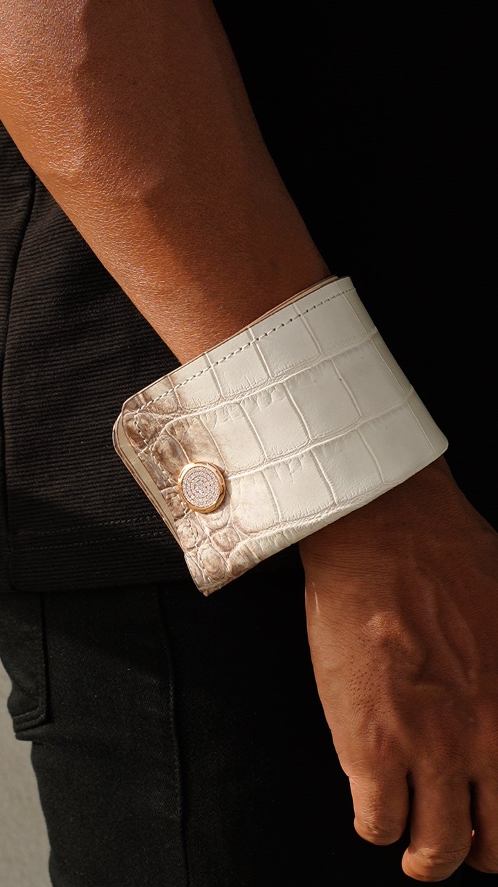Pale textured VALEUR cuff worn on the wrist