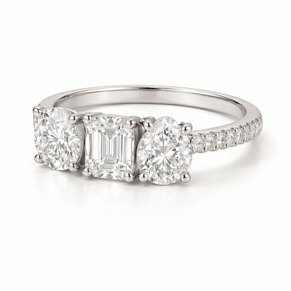 خاتم خطوبة بثلاثة أحجار مستديرة، زمرد وكمثرى